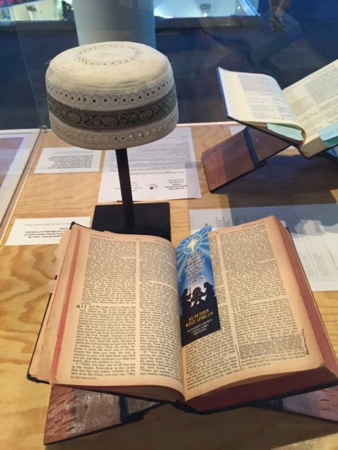 Photo of annotated Bible and Quran